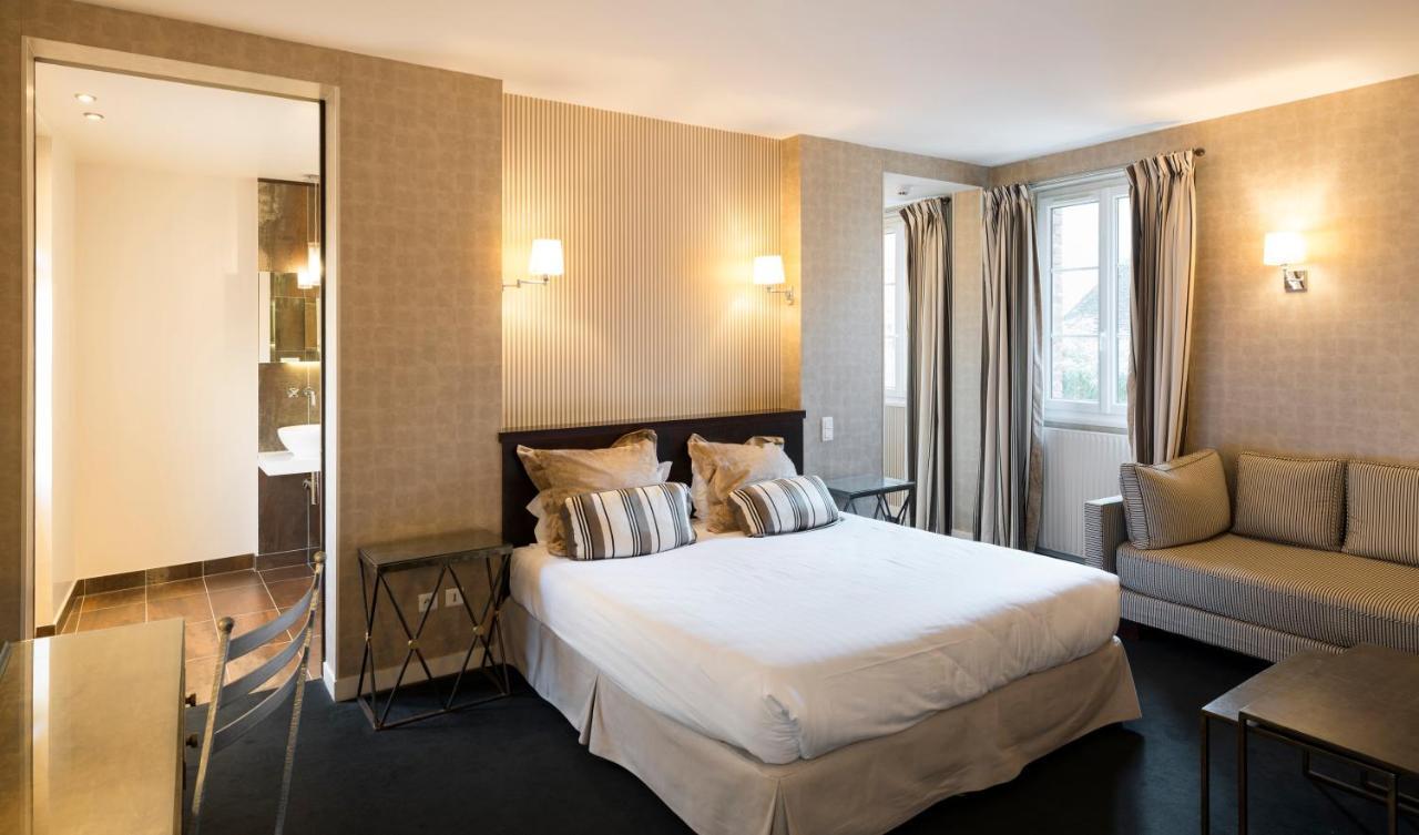 Logis - Hotel & Restaurant Du Tribunal 莫尔塔涅欧佩什 外观 照片