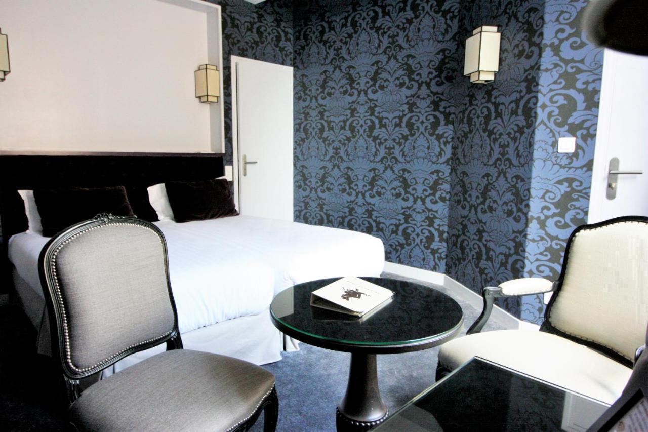 Logis - Hotel & Restaurant Du Tribunal 莫尔塔涅欧佩什 外观 照片